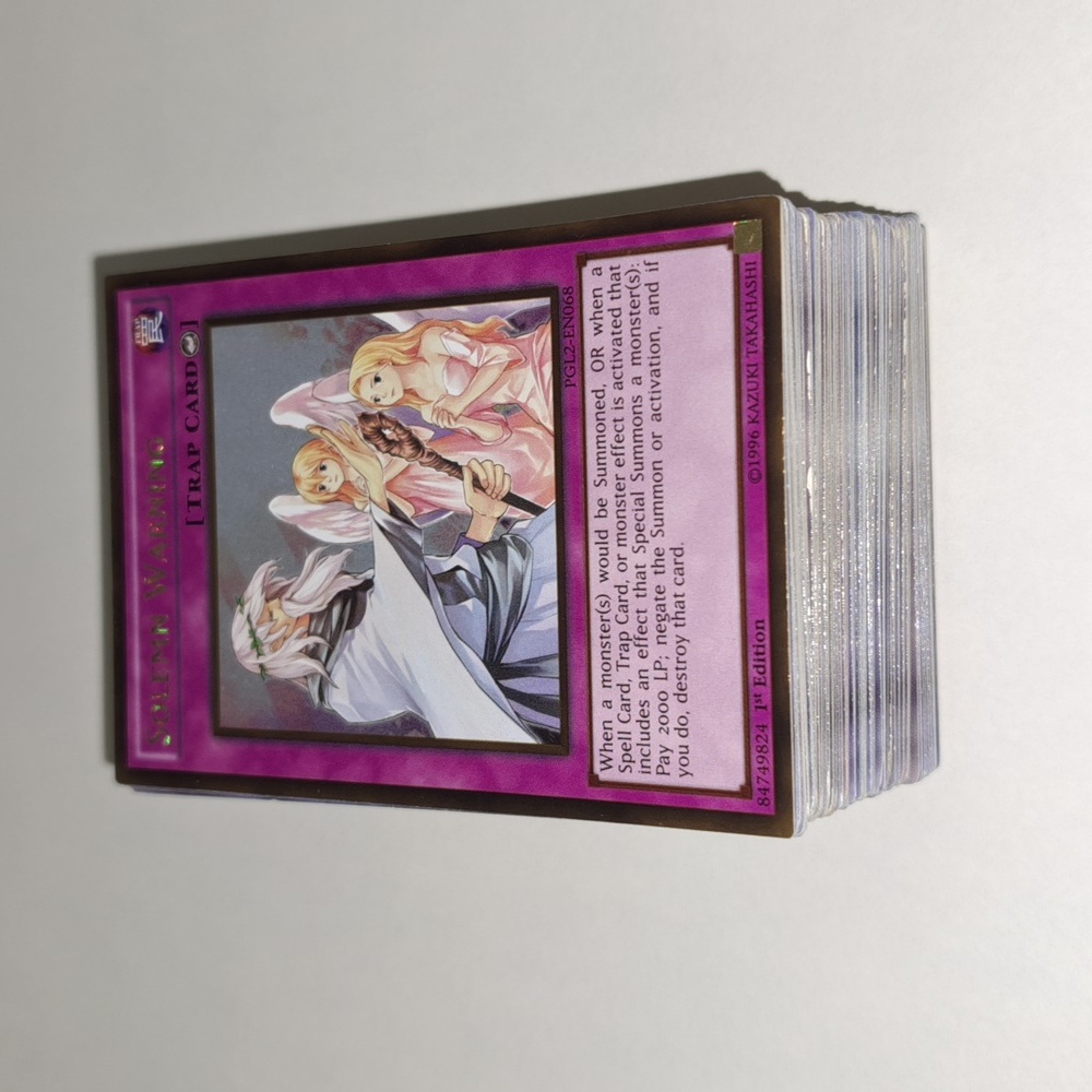107 random Yu-Gi-Oh cards